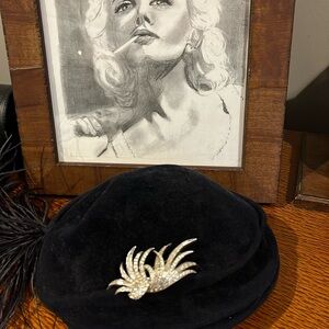 Vintage Marcel Boucher feather rhinestone pin.  Silvertone.